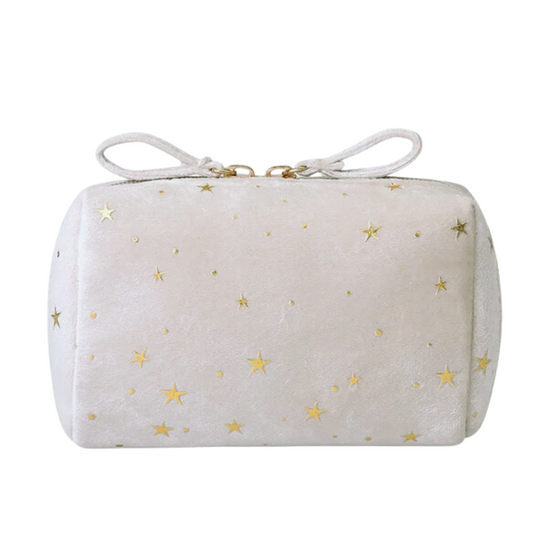 The Starlight Makeup Bag is out-of-this-world! Its golden star pattern and convenient size make it the ideal accessory to glamorously and discreetly keep your personal and beauty must-haves at arm's reach. 