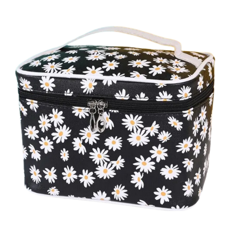 Go wild for this Delia Makeup Bag featuring a daisy pattern that’ll add a bit of flower power to any beauty look. Perfect for organizing your essentials, this stylish bag is sure to become your beauty BFF. 