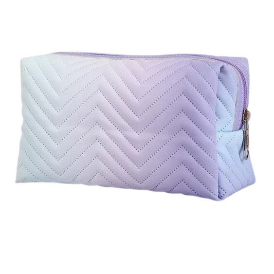 Let your beauty dreams come true with the Daydreamer Makeup Bag! Made with a soft ombre fabric, this bag will keep your cosmetics safe and secure - plus, its hip hue and unique design make it the perfect accessory to upgrade your makeup storage. Look your best wherever you go and dream away with this stylish bag!