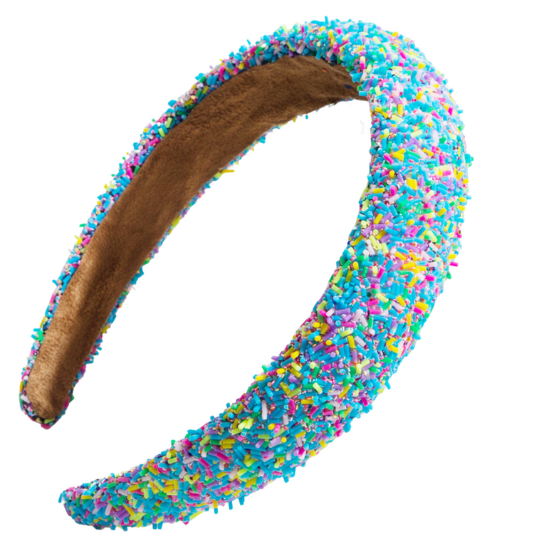 Made with a delicious rainbow of sprinkle-mix colors, this Funfetti Headband is an eye-catching way to spice up all of your favorite looks! Fun and sweet, this headband is sure to add some sparkle and sugar-coated style!