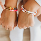 Break away from your everyday style with this Bohemian Heart Bracelet Set! This set of four modern, beachy, bracelets is perfect for adding a flirty, fun touch to your outfits. Colorful pink, gold and rainbow hues will be sure to get your heart fluttering! 