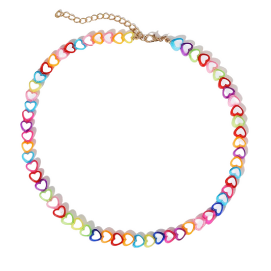 The Candy Girl Necklace will up your fashion game to the next level of sweetness! These heart-shaped "treats" come in a slew of scrumptious colors, guaranteeing you'll look simply adorable with that sugary swag. Perfect for all you confectionery queens out there!