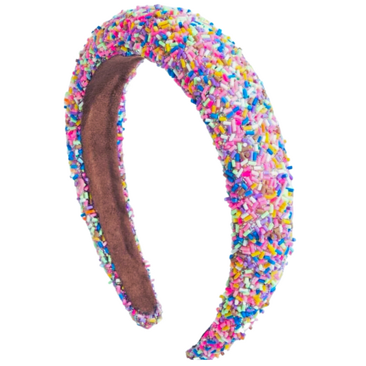 Made with a delicious rainbow of sprinkle-mix colors, this Funfetti Headband is an eye-catching way to spice up all of your favorite looks! Fun and sweet, this headband is sure to add some sparkle and sugar-coated style!