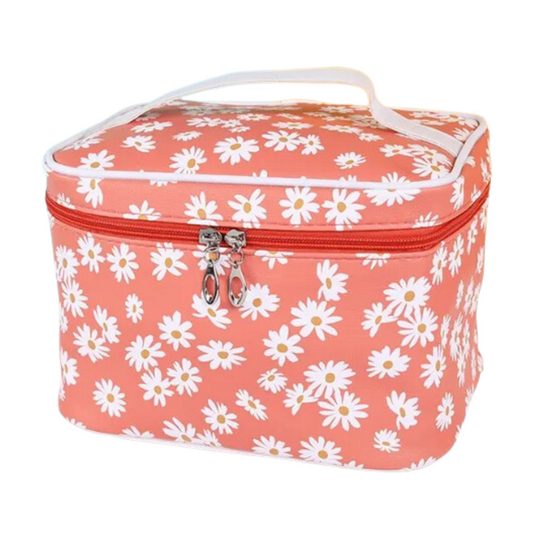 Go wild for this Delia Makeup Bag featuring a daisy pattern that’ll add a bit of flower power to any beauty look. Perfect for organizing your essentials, this stylish bag is sure to become your beauty BFF.