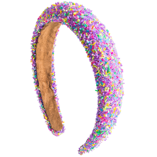 Made with a delicious rainbow of sprinkle-mix colors, this Funfetti Headband is an eye-catching way to spice up all of your favorite looks! Fun and sweet, this headband is sure to add some sparkle and sugar-coated style!