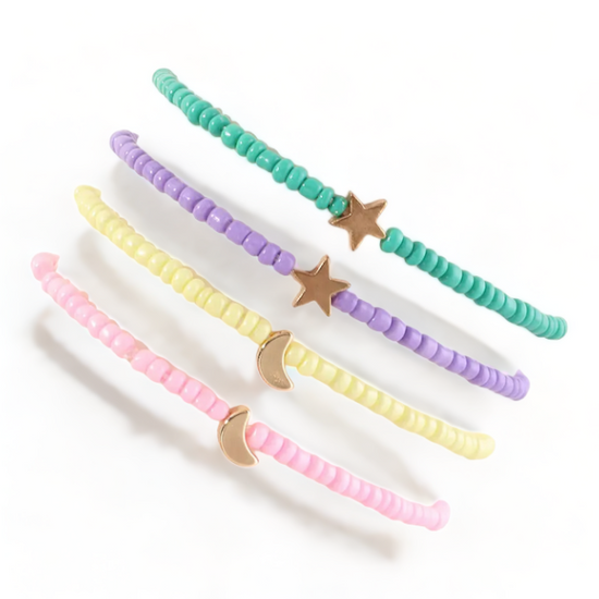 Show off your celestial style with this stellar Star & Moons Anklet Set! Featuring four anklets in soft colors of green, purple, yellow, and pink, these anklets will make you the envy of the night sky! So shine bright - and don't forget to twinkle!